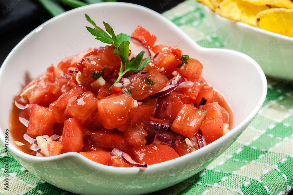 Bowl of fresh salsa with tortilla chips Bowl of fresh salsa with tortilla chips