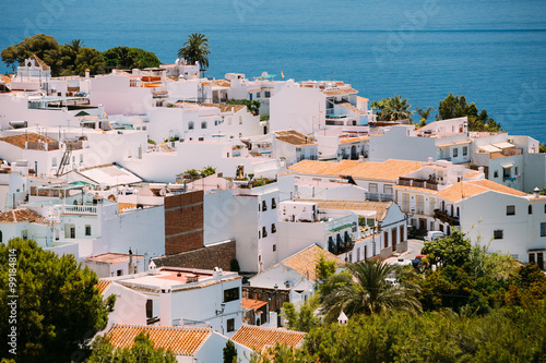 White color houses in Nerja, Malaga Province, Andalusia, Spain photo