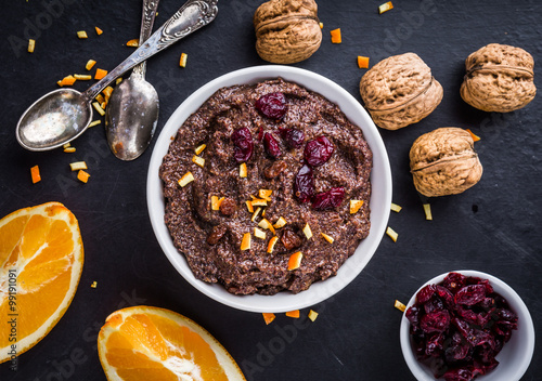 Obraz na płótnie poppy seed mass with raisins, cranberries, orange peel