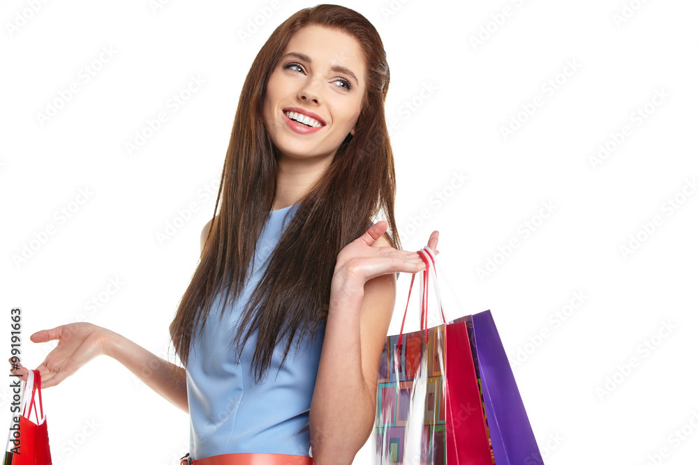 lovely woman with shopping bags over white lovely woman with shopping bags over white