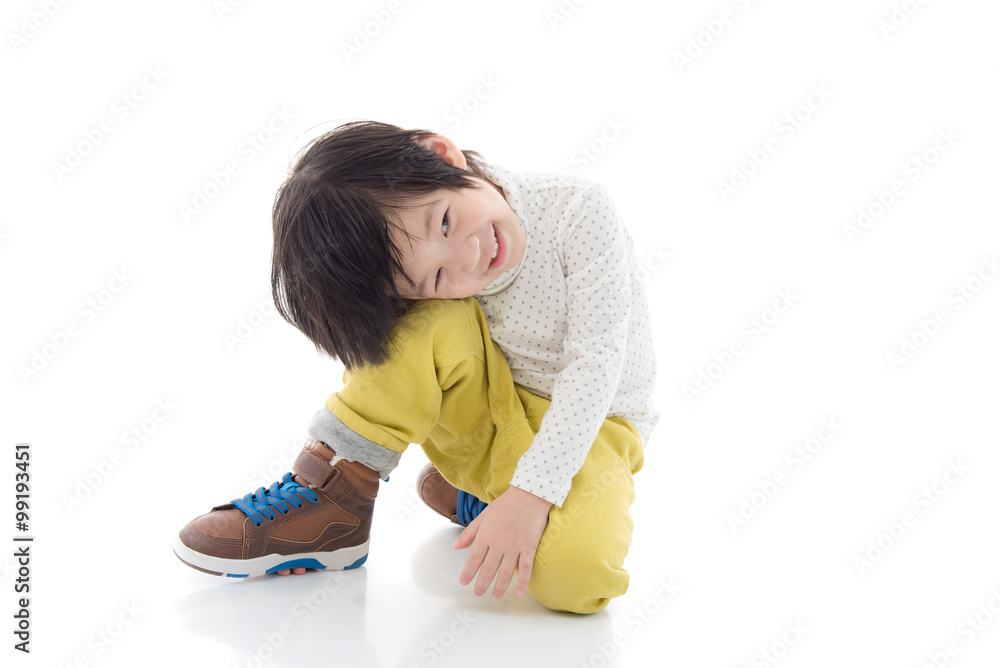 asian boy sitting on white background isolated asian boy sitting on white background isolated