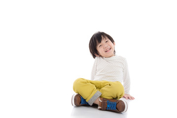 asian boy sitting on white background isolated
