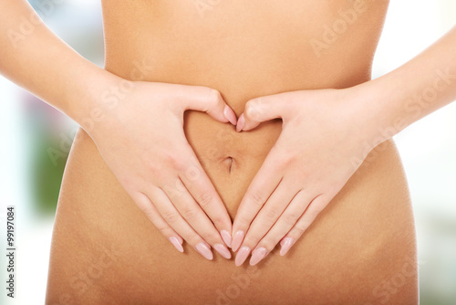 Wallpaper Mural Woman with her hands on belly. Torontodigital.ca