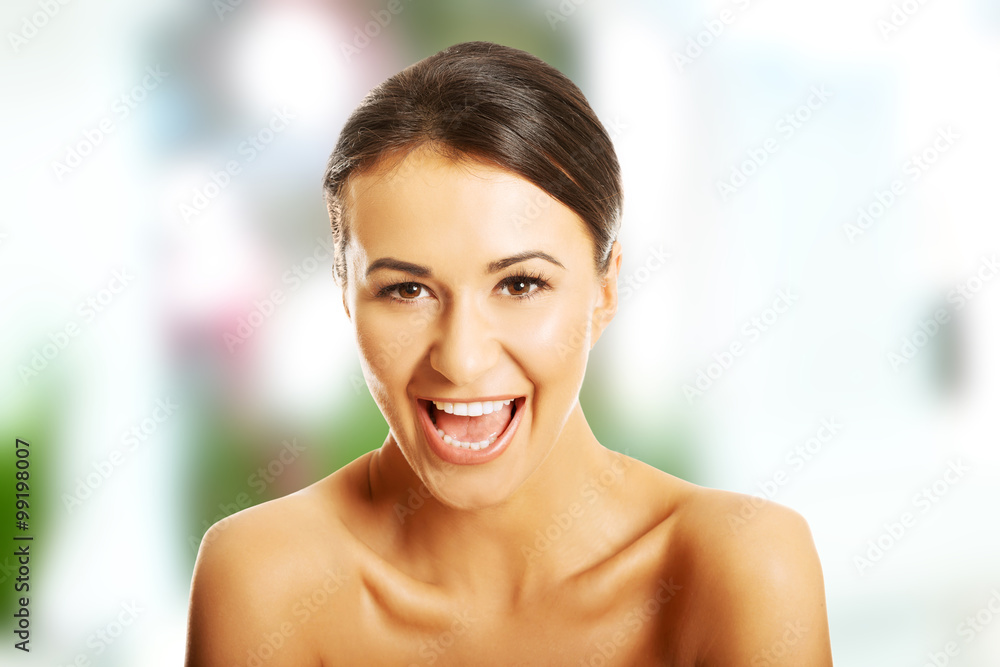 Portrait of nude woman laughing loud Portrait of nude woman laughing loud