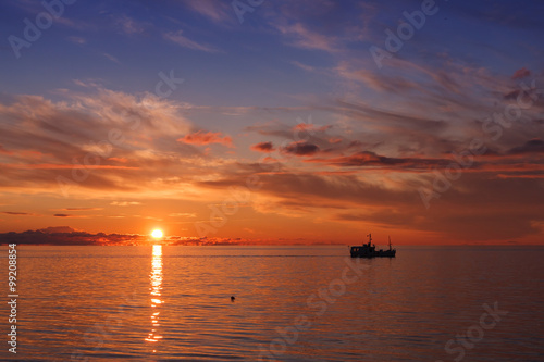 beautiful orange sunset on the Baltic sea. © Aleksandr Simonov