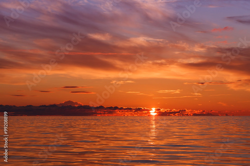 beautiful orange sunset on the Baltic sea. © Aleksandr Simonov