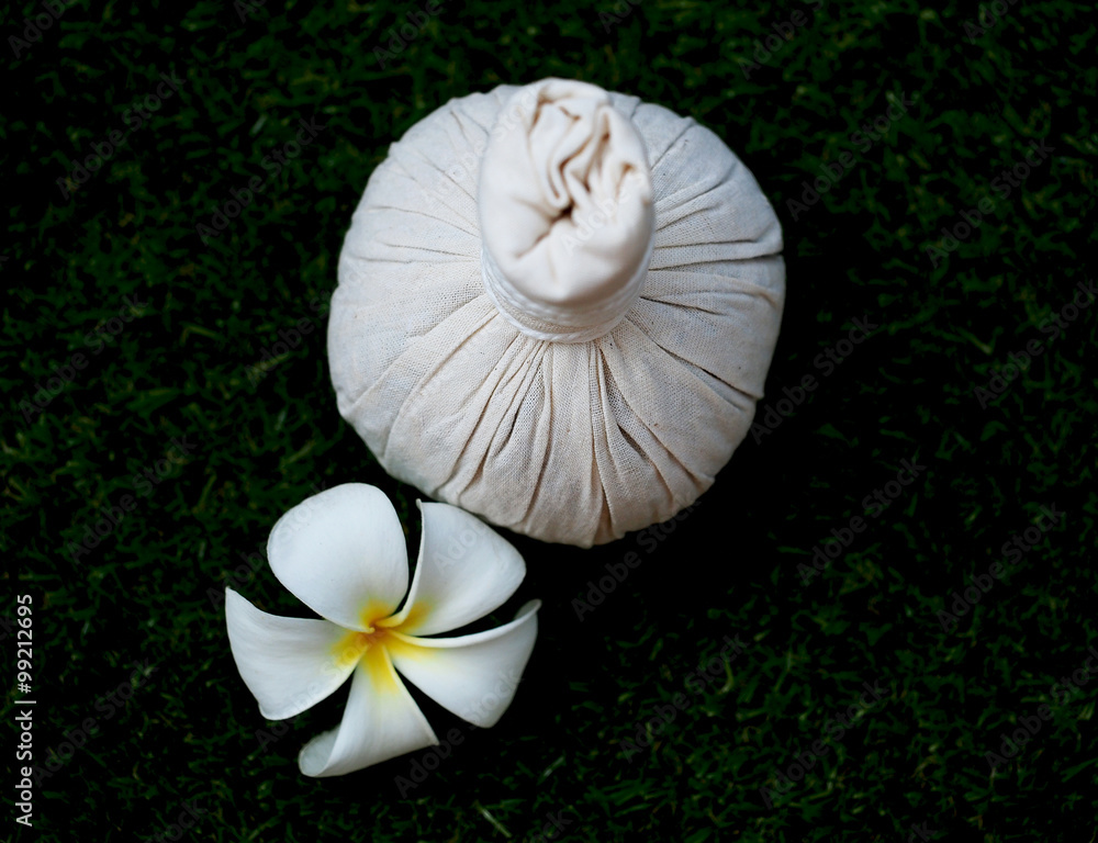 Obraz premium Spa massage compress balls with flower, Thailand