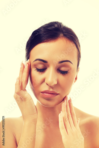 Spa woman touching her face