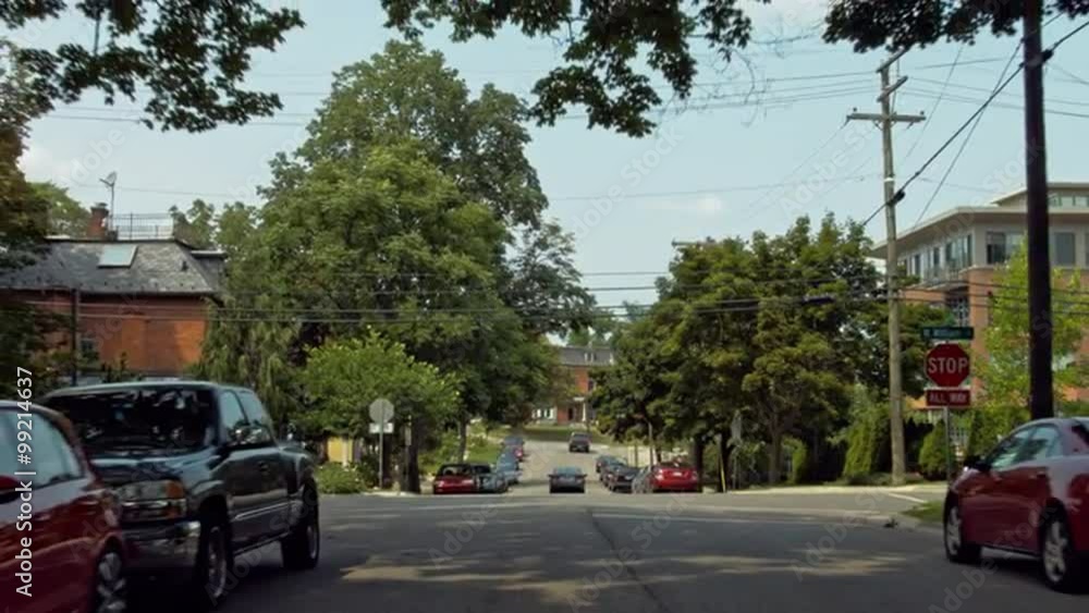 Driving plate: rear view, 1920s-30s timber-frame houses in Mid West US neighborhood. Intended for compositing. 24mm lens, stabilized clip Driving plate: rear view, 1920s-30s timber-frame houses in Mid West US neighborhood. Intended for compositing. 24mm lens, stabilized clip