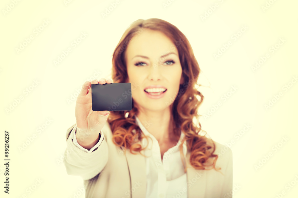 Naklejka premium Businesswoman holding blank card.