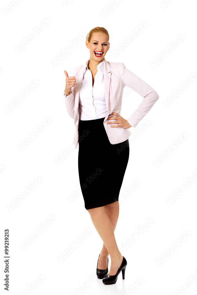 Young happy business woman with thumb up Young happy business woman with thumb up
