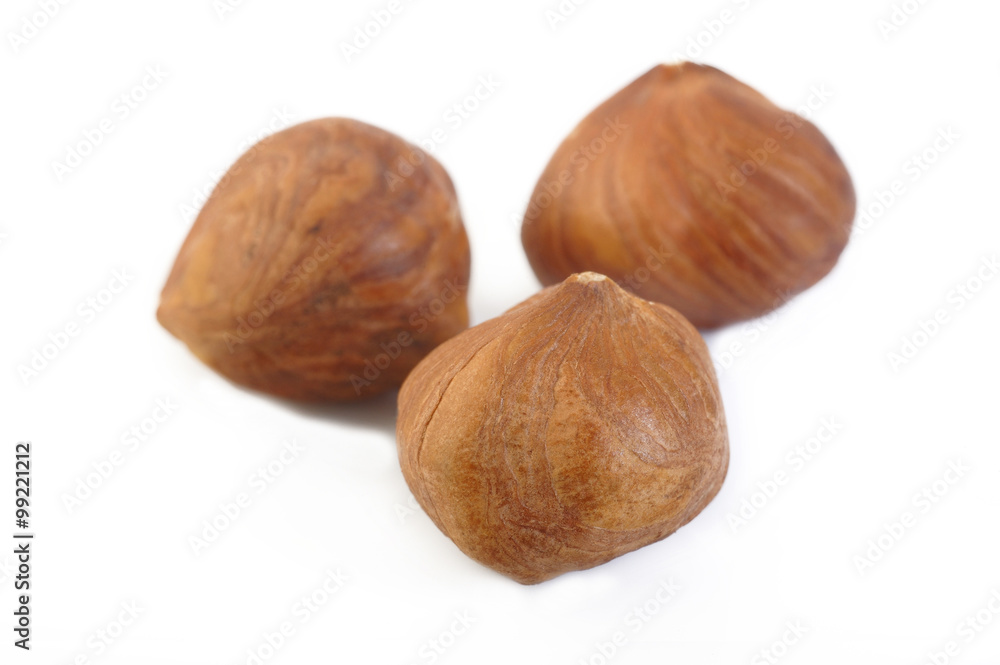 peeled hazelnuts isolated on white peeled hazelnuts isolated on white