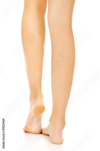 The legs of a young woman