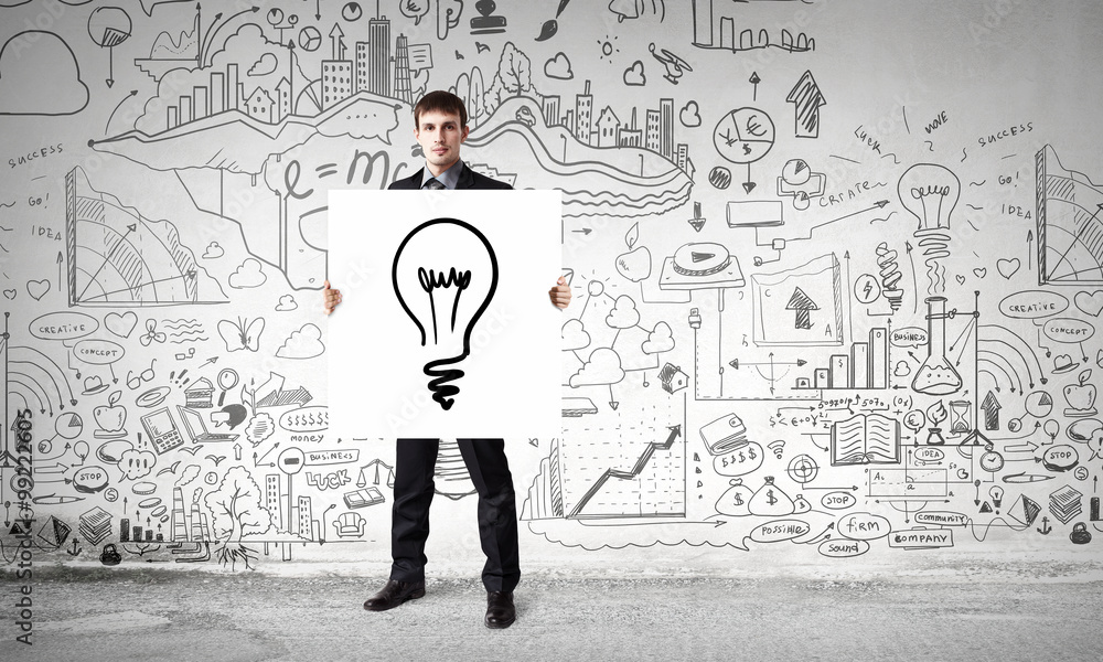 Businessman demonstrating banner with ideas Businessman demonstrating banner with ideas