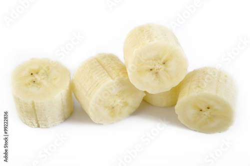 sliced bananas on white background