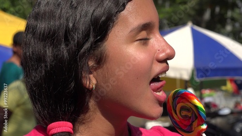 Teen Girl Eating Lollipop Candy