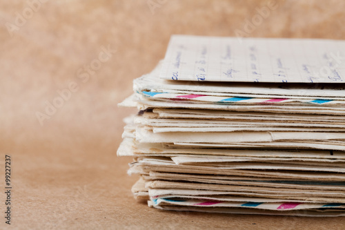 Картината върху платно Stack of old envelopes and letters on kraft paper