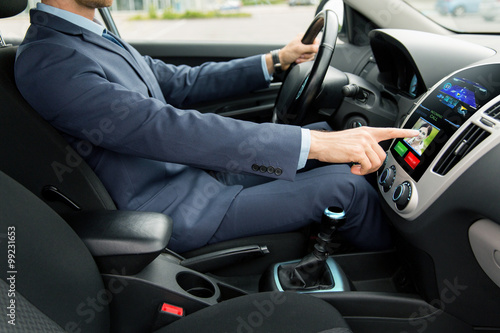 close up of man driving car and incoming call