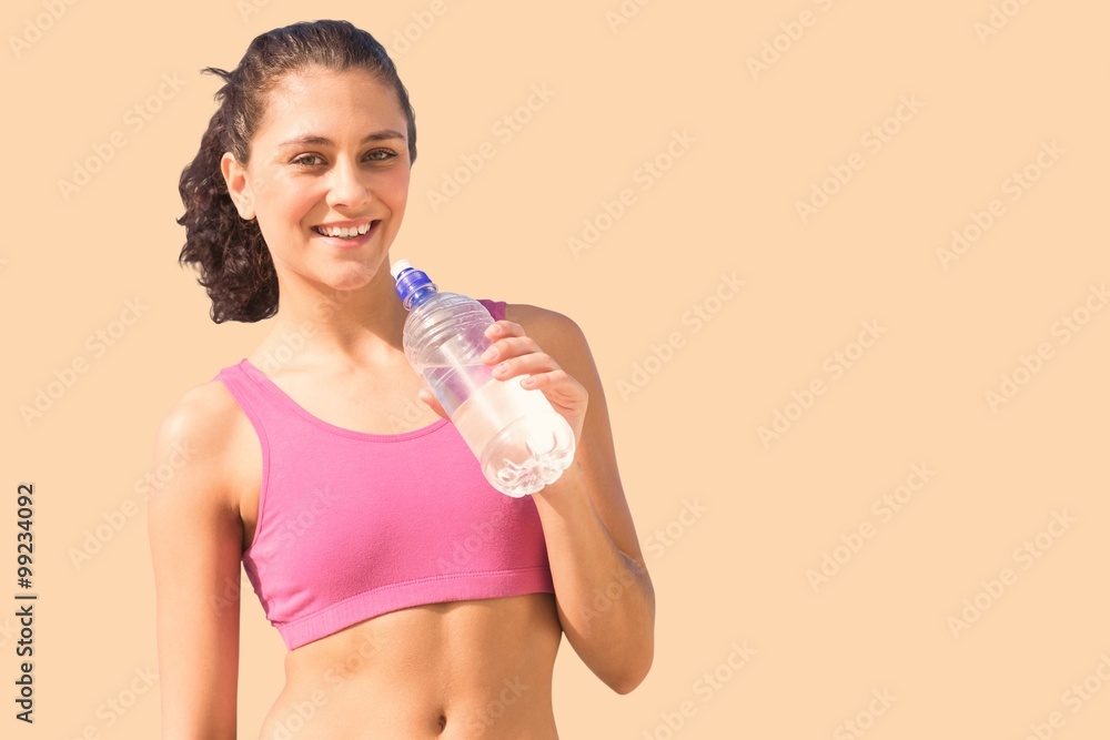 Composite image of fit woman with water Composite image of fit woman with water