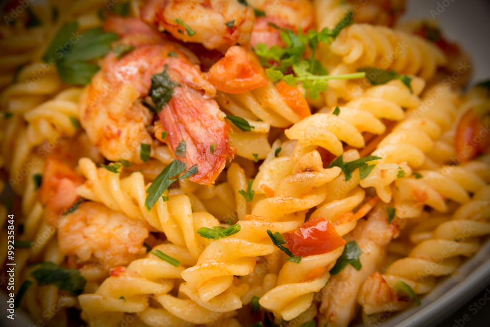Fusilli ai gamberi e pomodoro, pasta with shrimps and tomato sauce Fusilli ai gamberi e pomodoro, pasta with shrimps and tomato sauce