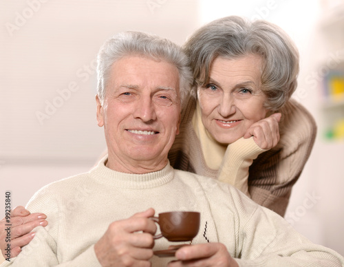 beautiful older couple with coffee