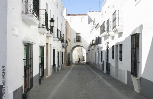 Whitewashed houses at village streets of Olivenza, Spain photo
