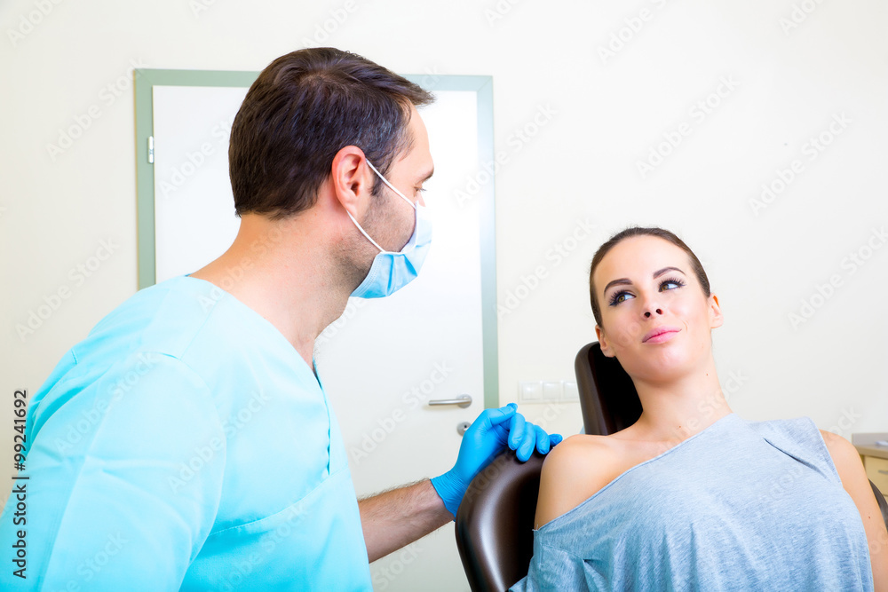 Fototapeta premium Young woman at the Dentist.
