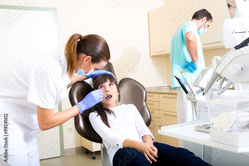 Young girl getting her dental checkup