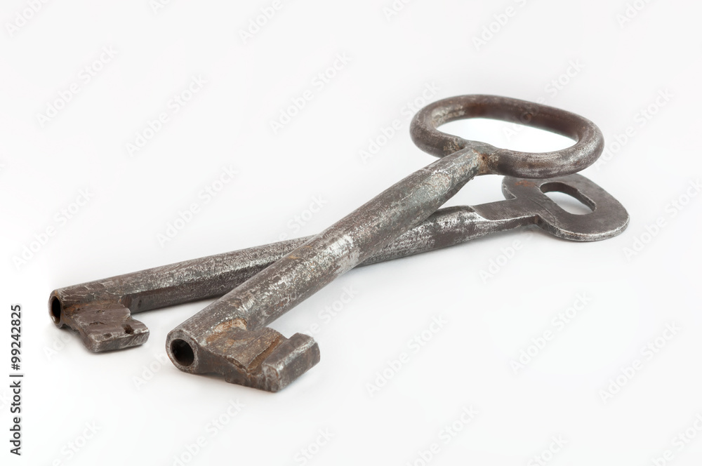 Pair of old keys isolated on white background Pair of old keys isolated on white background