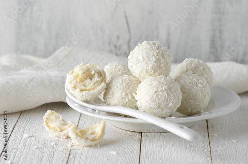 Coconut candies pile in white plate