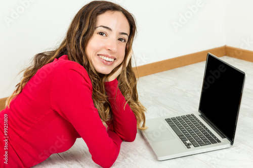 Happy woman with her laptop