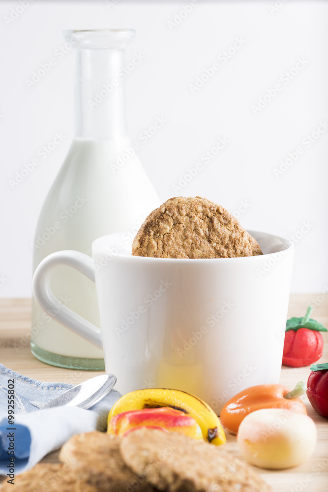 Breakfast with fresh milk, biscuits and candy during the winter cold Breakfast with fresh milk, biscuits and candy during the winter cold