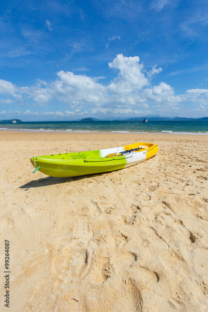 Canoe on the beach at sunshine day, Phayam Island, Ranong Province, Thailand Canoe on the beach at sunshine day, Phayam Island, Ranong Province, Thailand