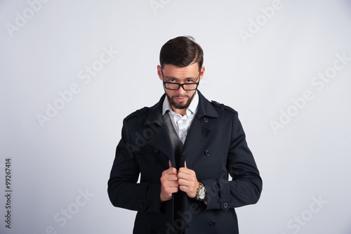 Young businessman in a black cloak