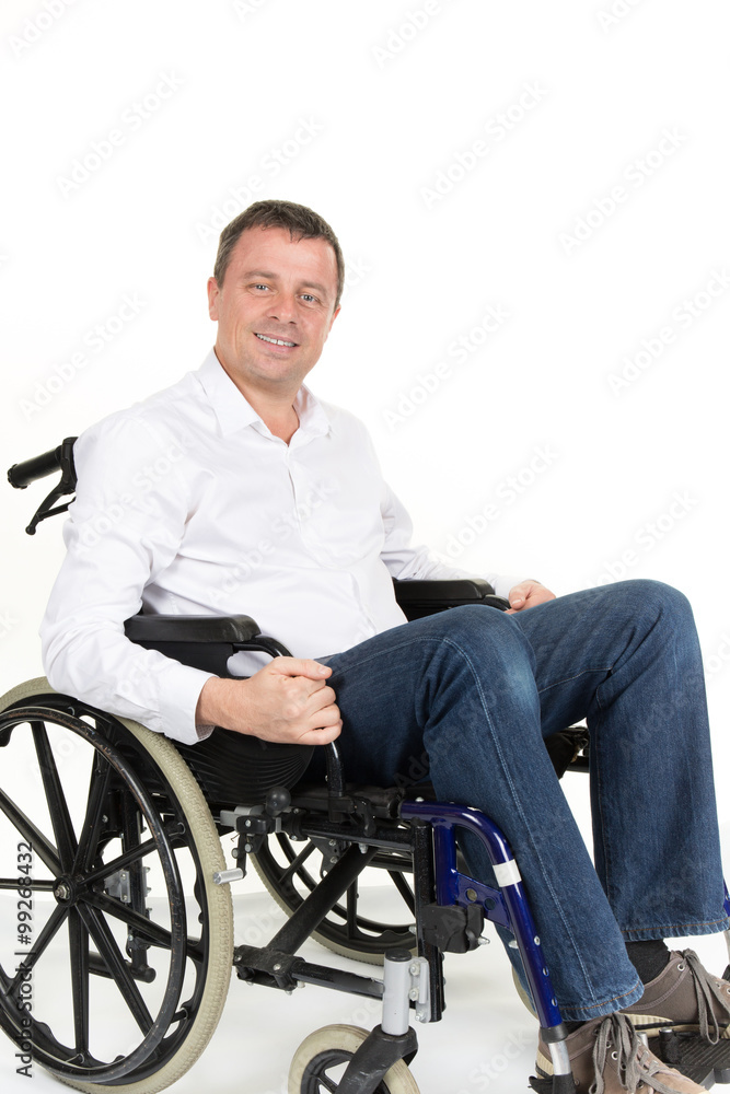 Portrait of charming man in wheelchair. Isolated on white Portrait of charming man in wheelchair. Isolated on white