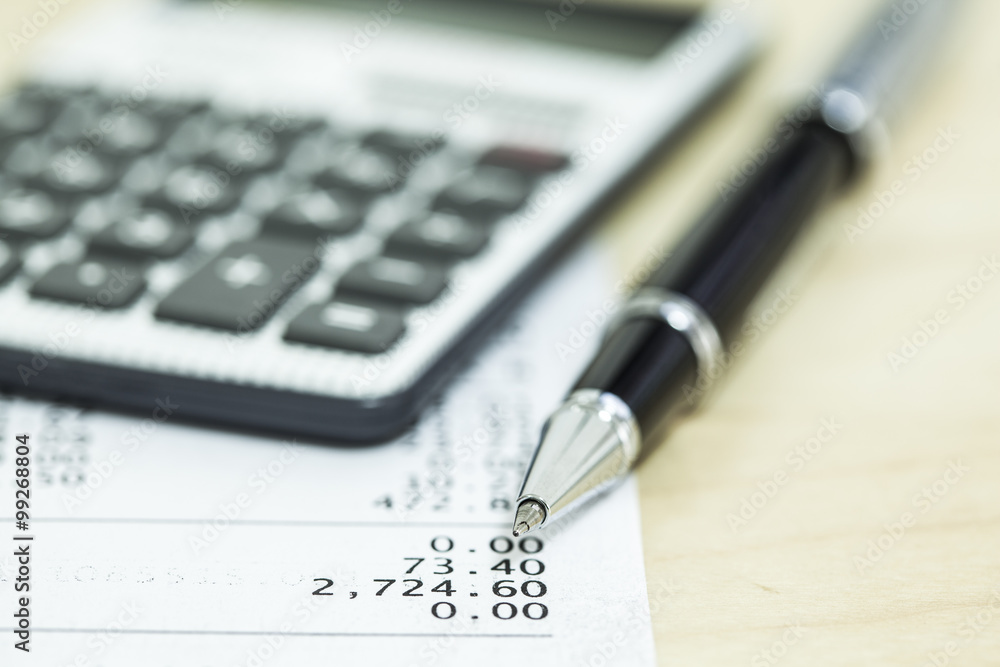 Closeup view calculator and document Closeup view calculator and document