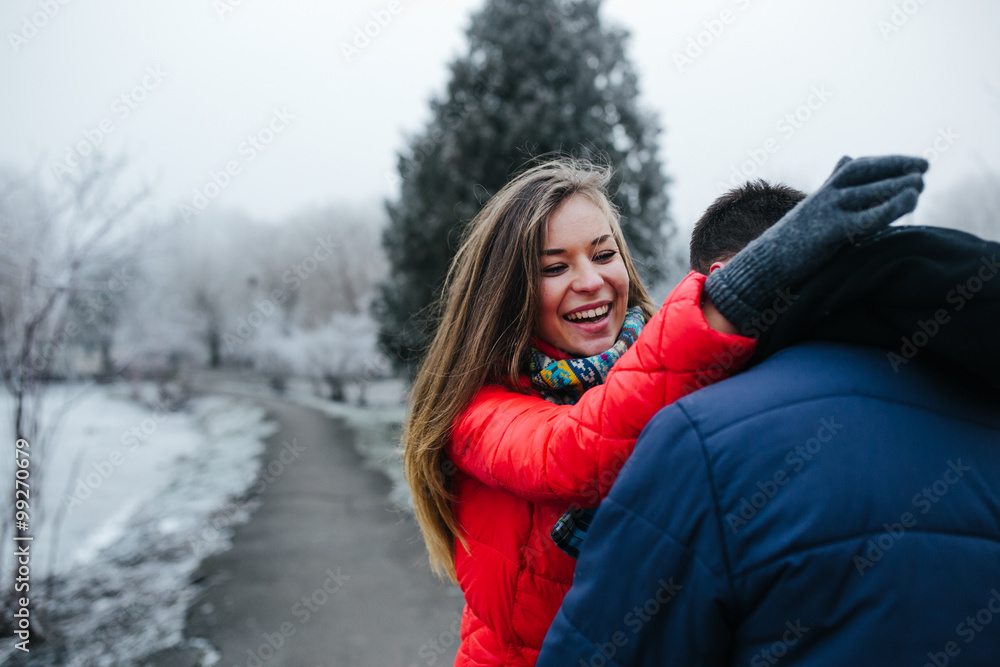 Obraz premium Young beautiful couple having fun