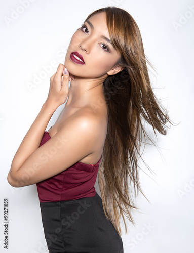 beautiful young asian woman with flawless skin and perfect make-up