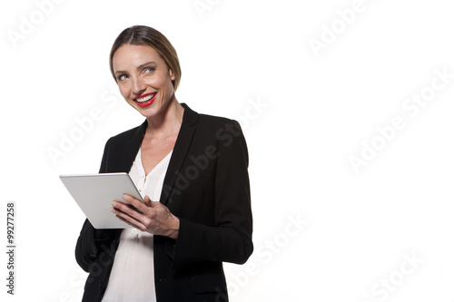 Woman using a tablet isolated on white