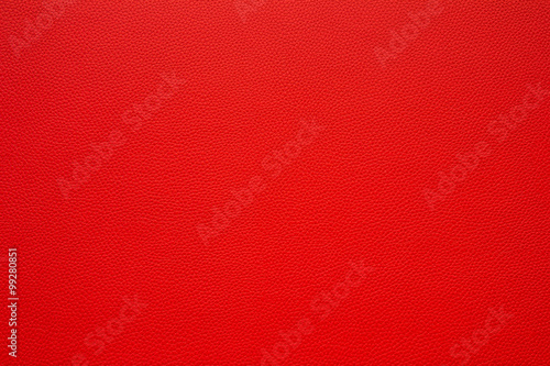 Red leather background.