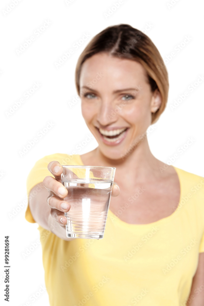 Portrait of a happy woman holding a glass of fresh water Portrait of a happy woman holding a glass of fresh water