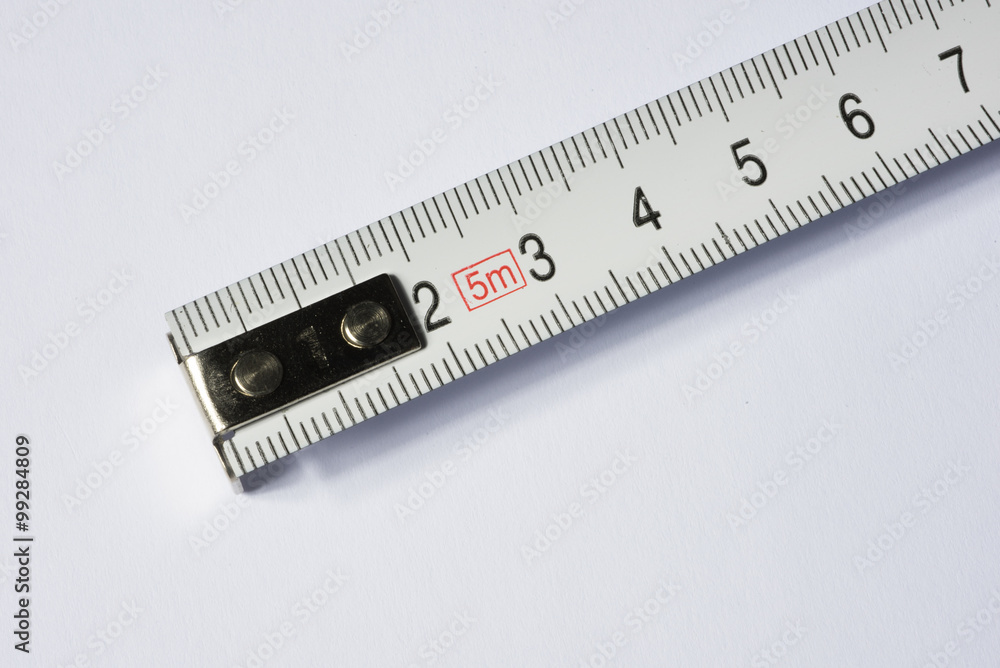 close up of measuring tape isolated on white