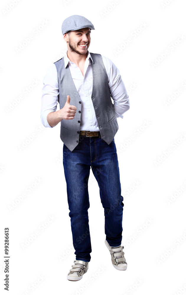 Young handsome man posing and giving a thumb up isolated on white background Young handsome man posing and giving a thumb up isolated on white background