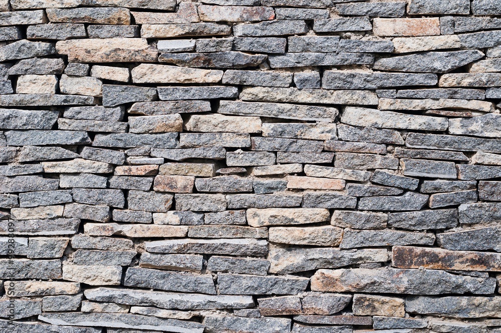 Gray stone wall background, texture