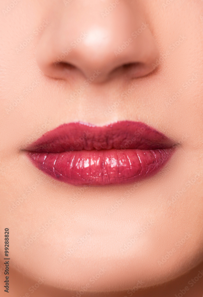 Close up portrait of beautiful young woman face, red lips Close up portrait of beautiful young woman face, red lips