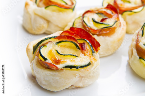 roses puff pastry with zucchini and bacon photo