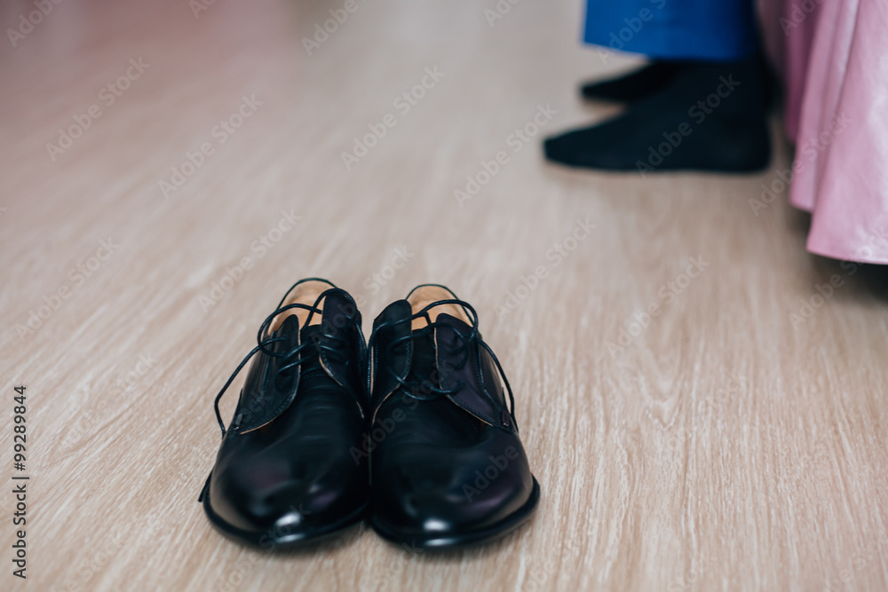Businessman or groom wears shoes Businessman or groom wears shoes