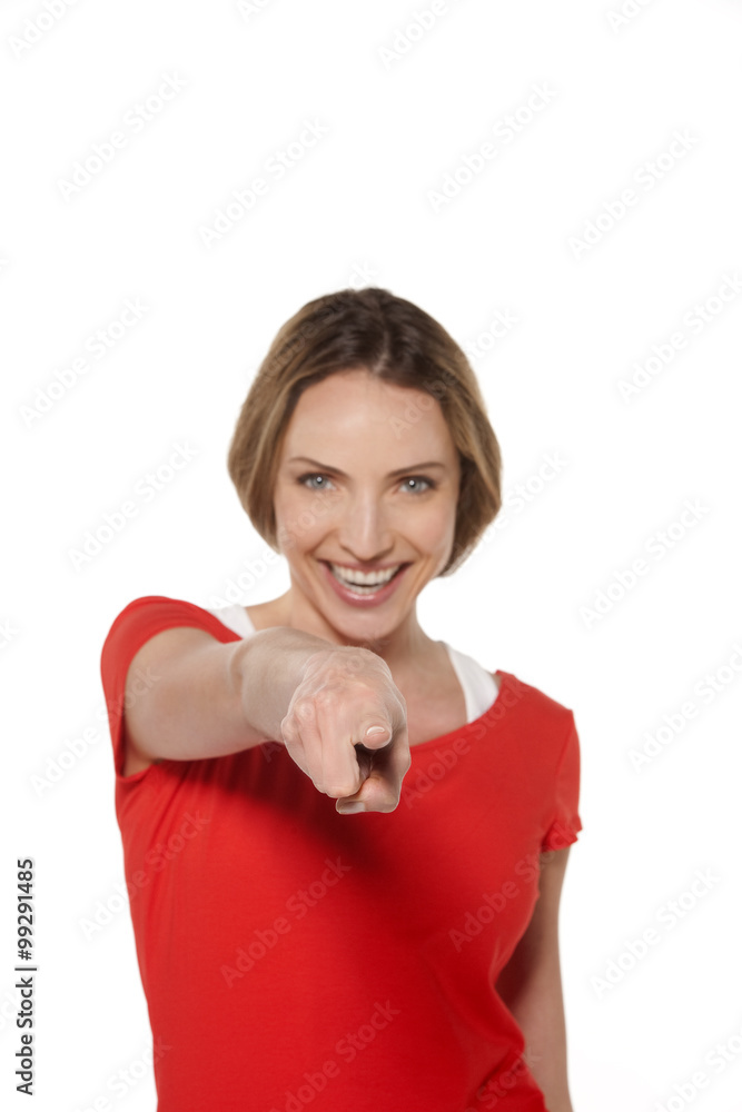 Woman pointing at camera - isolated Woman pointing at camera - isolated