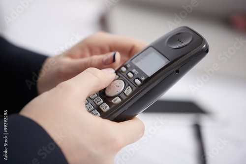 Radio phone in female hands