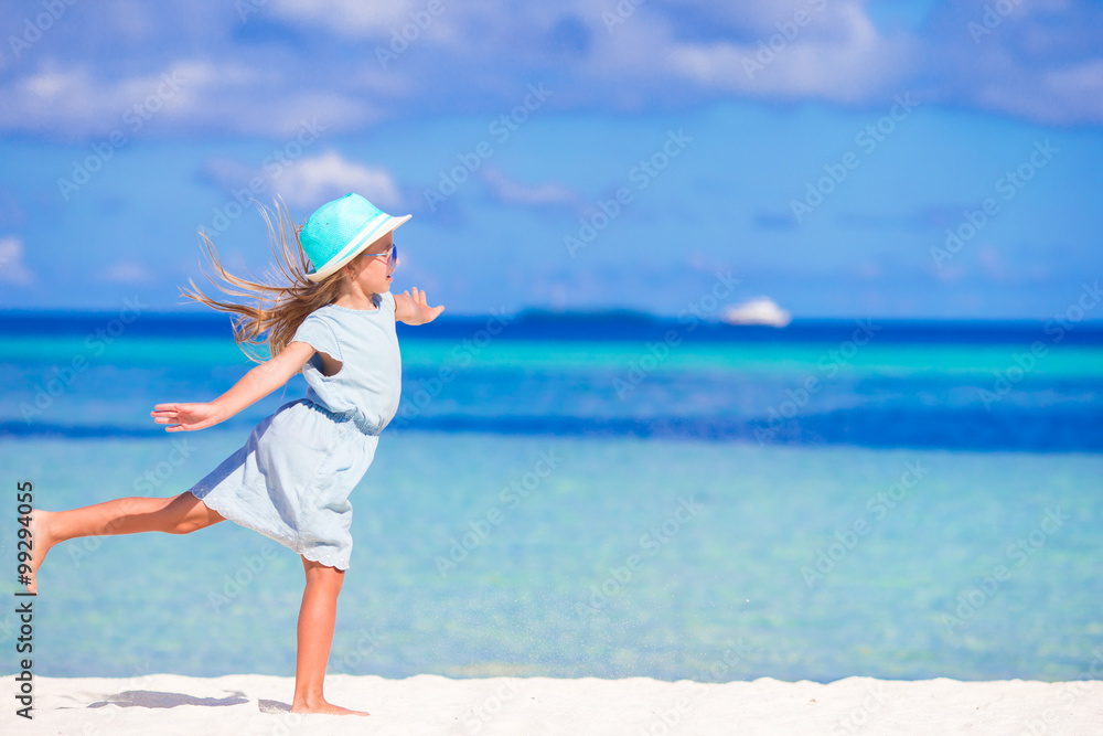 Adorable little girl during beach vacation having fun Adorable little girl during beach vacation having fun